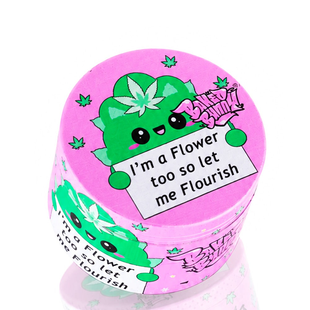 Open Let Me Flourish pink metal grinder – cute cannabis leaf character open lid view, flower girl stoner aesthetic, sparkly pink weed grinder, kawaii herb accessory