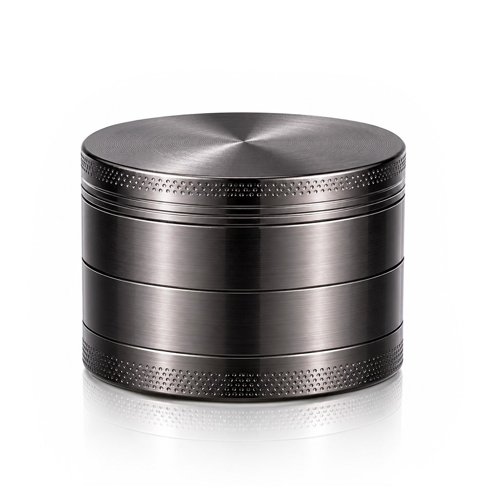 Gunmetal grey 4-piece metal weed grinder from Bong Warehouse, closed front view with brushed lid and knurled grip