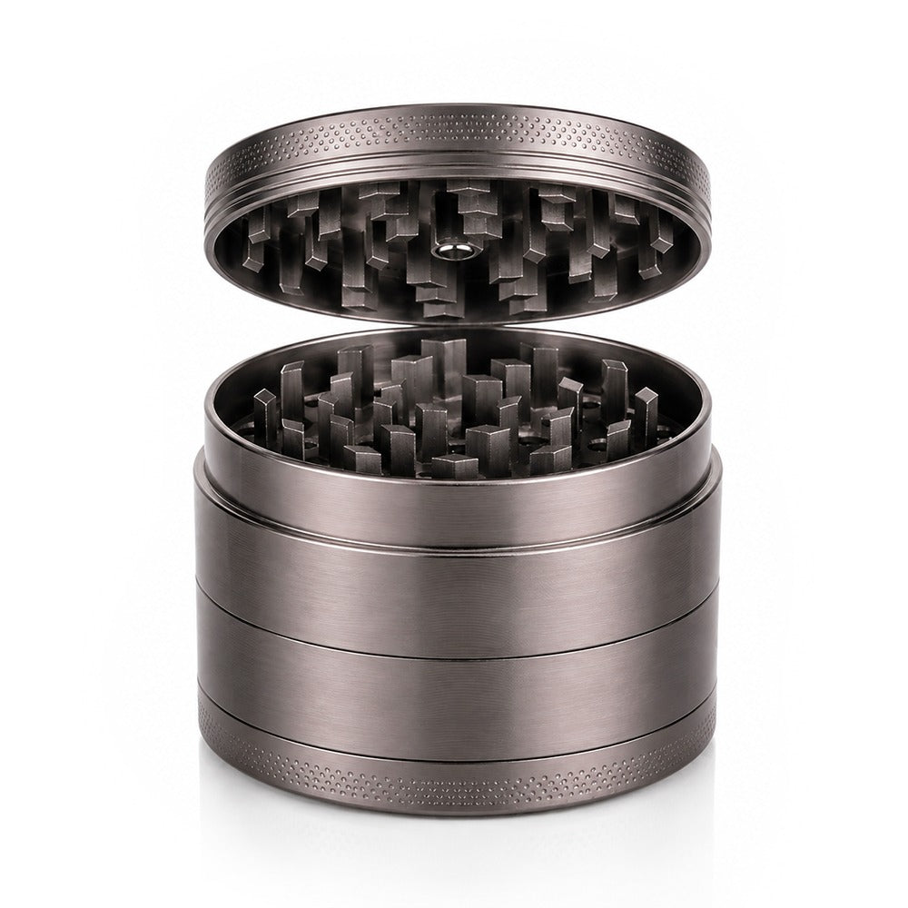 Gunmetal grey 4-piece metal weed grinder from Bong Warehouse with the lid lifted off, showing the grinding chamber