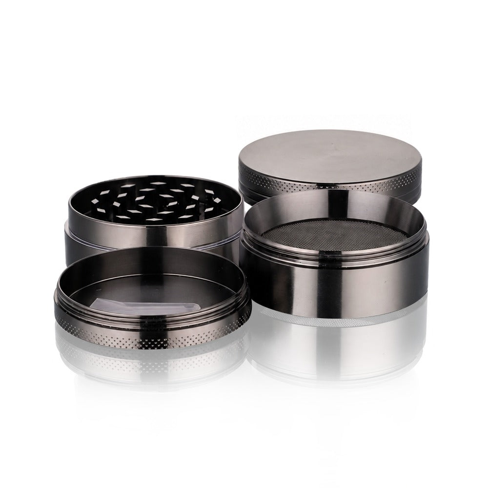 Gunmetal grey 4-piece metal weed grinder from Bong Warehouse fully apart, showing teeth, screen, lid and base