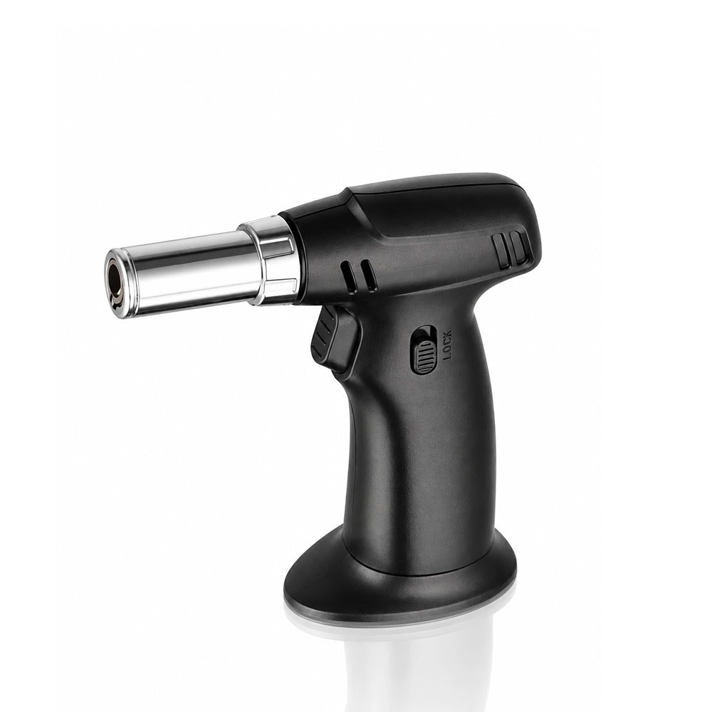 Black pistol grip torch lighter, angled view showing the trigger and LOCK slide switch | Bong Warehouse