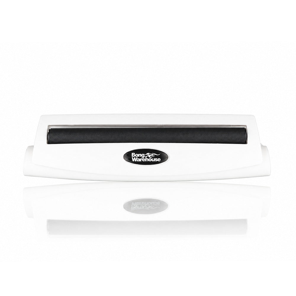White king size 110mm plastic cigarette rolling machine from Bong Warehouse, front view with the black rolling apron and Bong Warehouse badge