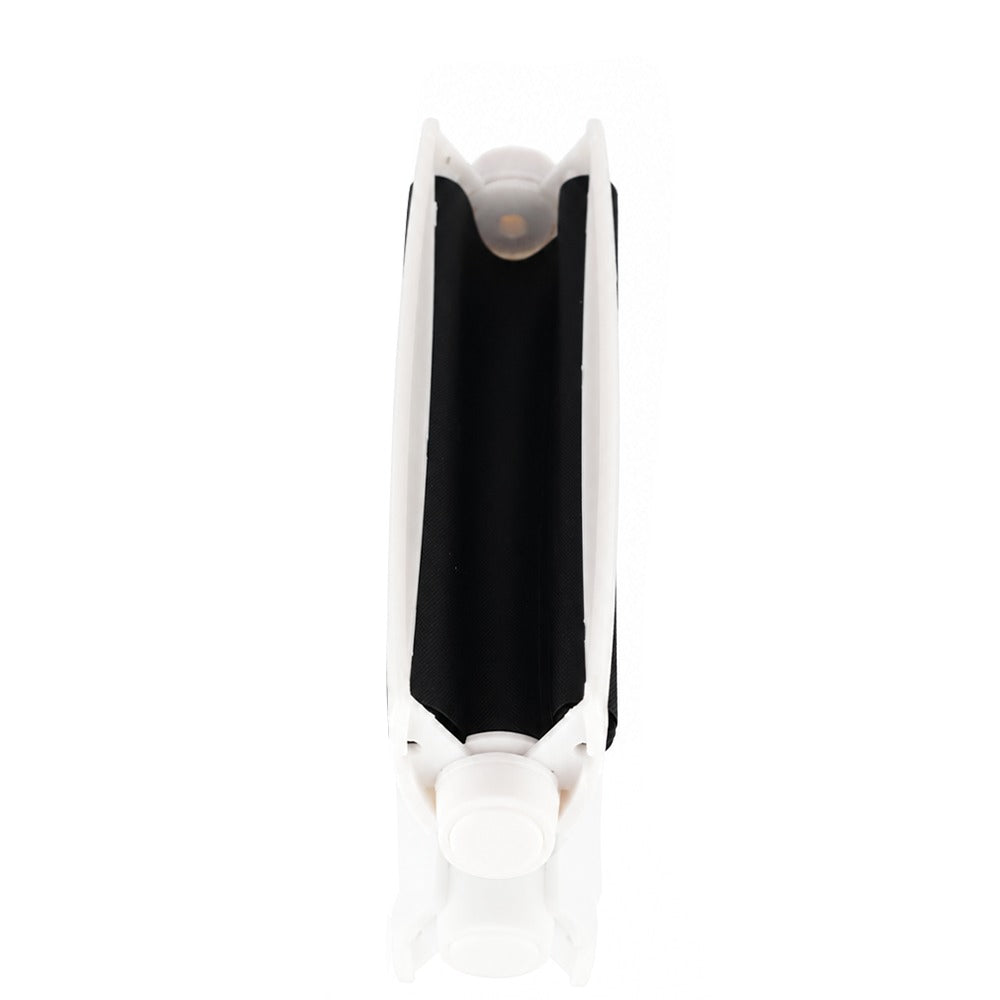White king size 110mm plastic cigarette rolling machine from Bong Warehouse, top-down view along the open machine showing the black rollers