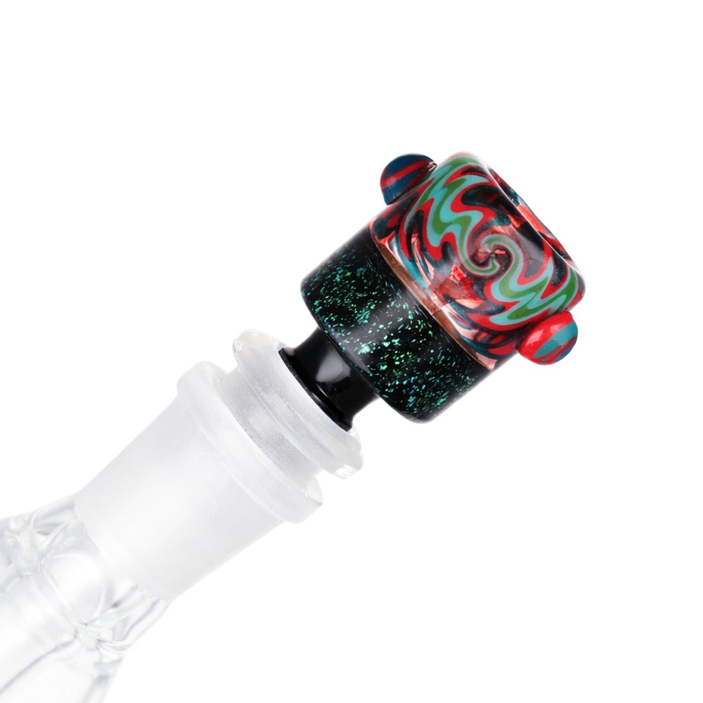 Angled view of BW Galaxy Vortex Glass Cone Piece 14mm Male Bowl in Red and Teal on white background, showcasing vibrant color blend