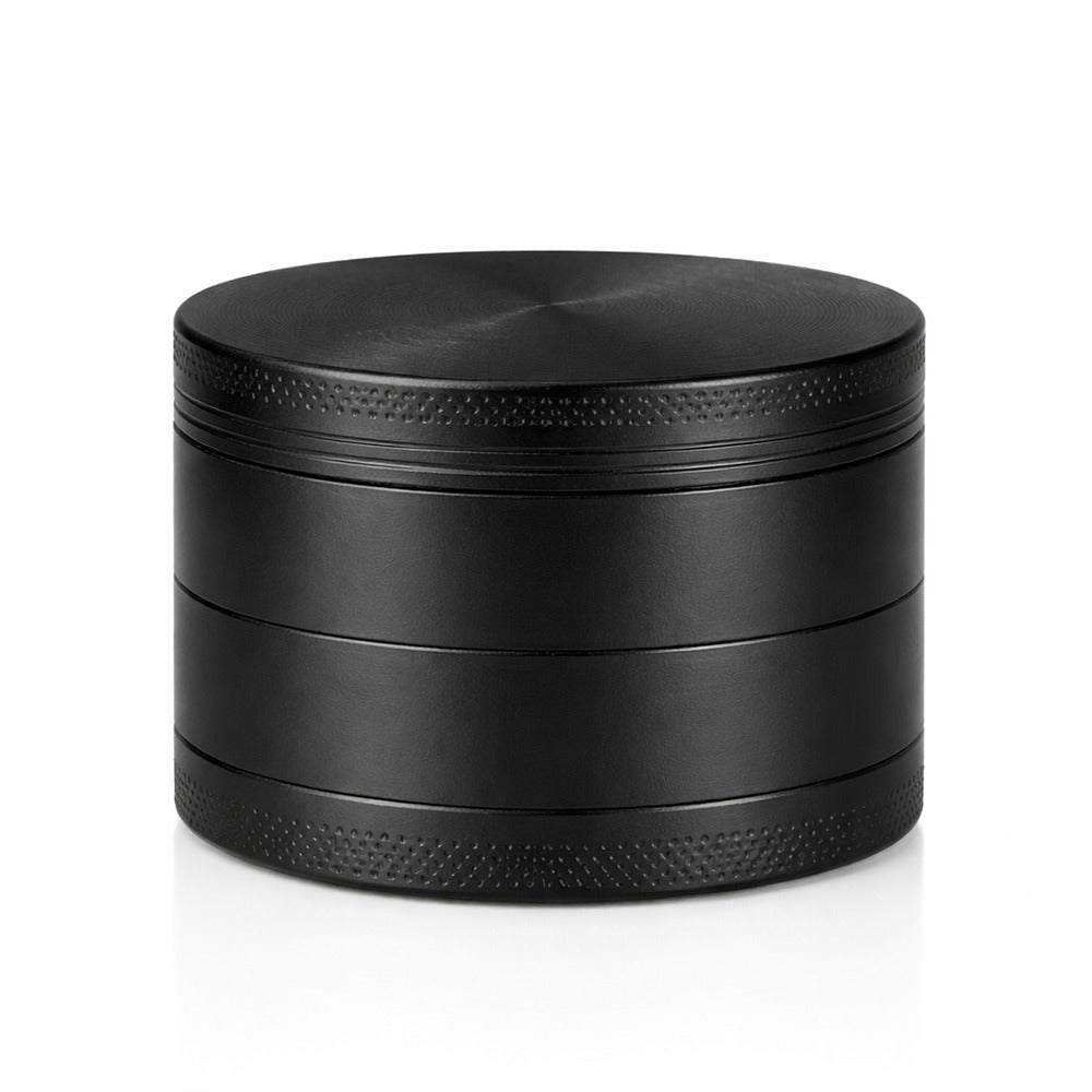 Black round metal weed and herb grinder, closed side view | Bong Warehouse
