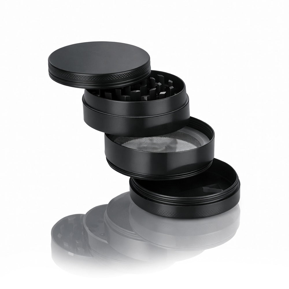 Black round metal weed and herb grinder shown in stacked layers | Bong Warehouse