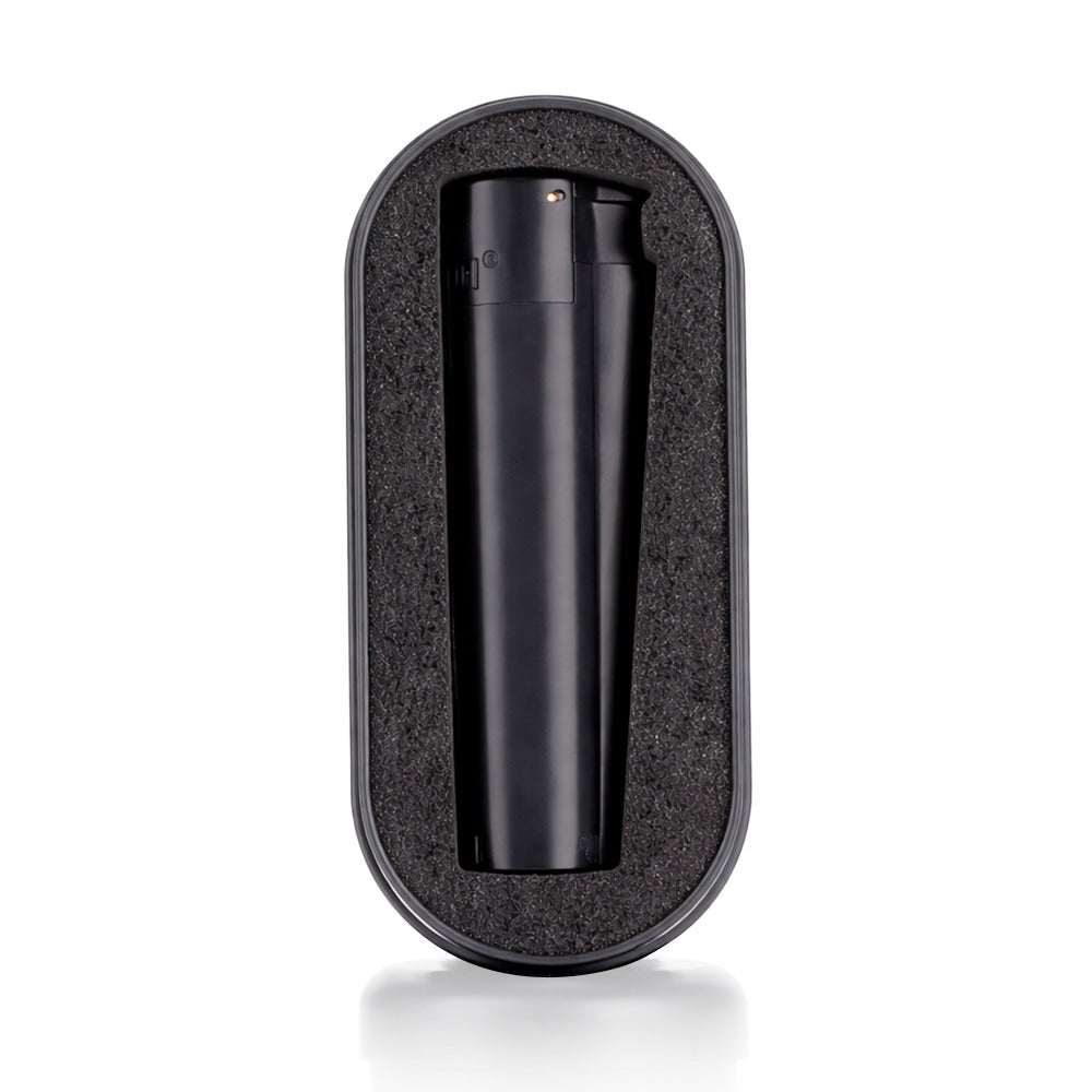Black cylindrical product in a textured black case on a white background