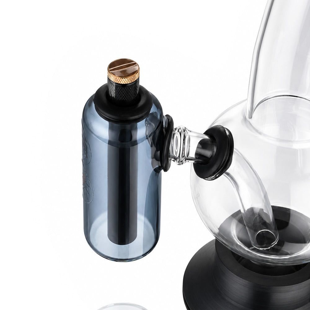 Neon grey tube ash catcher fitted to a glass bong, front view