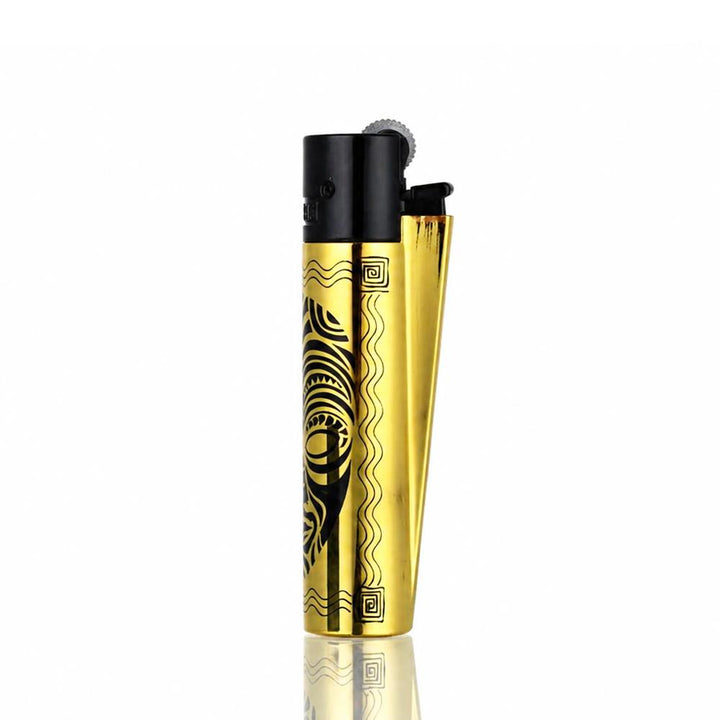 Side View of Gold Metal Clipper Totems lighter with engraved tribal mask design