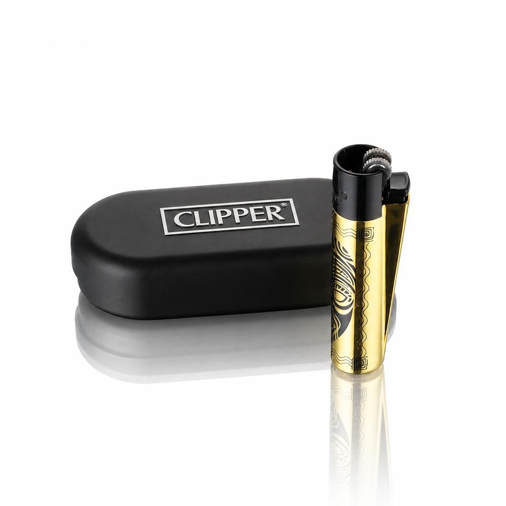 Gold Metal Clipper Totems lighter with engraved design and black Clipper case