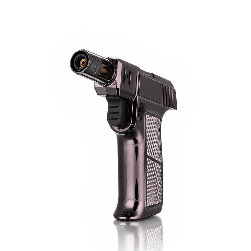 Close view of the single brass jet burner on a gunmetal torch lighter | Bong Warehouse