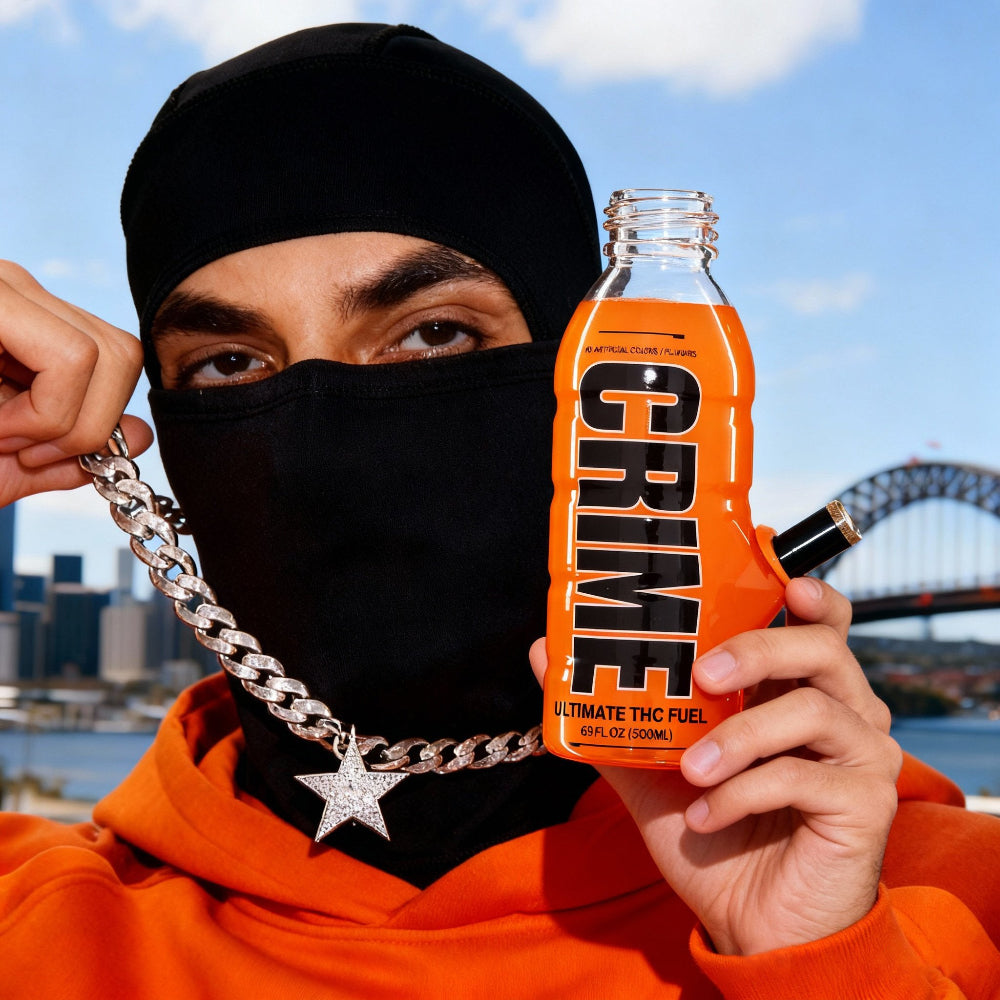 Bong Warehouse Eshay holding Mini Bottle 17.5cm Glass Bong - Crime Orange in sydney