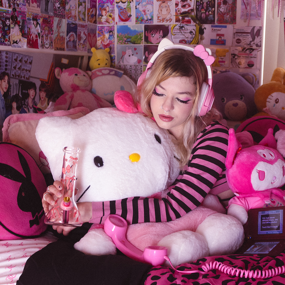 Bong Warehouse Ribbons and Bows Beaker Bong 20cm in pink held by woman hugging Hello Kitty