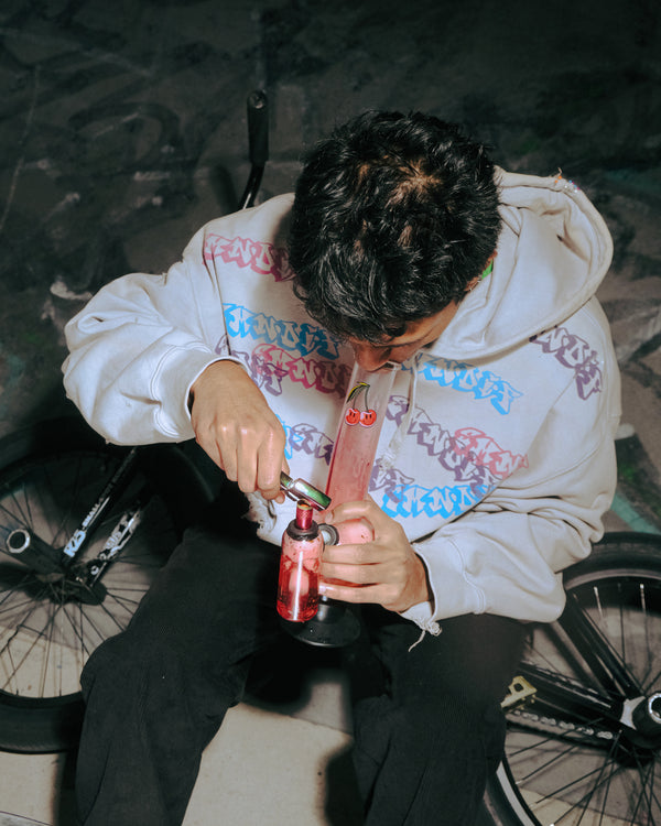 Lighting up a Bong Warehouse Double Chamber 30cm Glass Bong in Pink Cherry Bomb