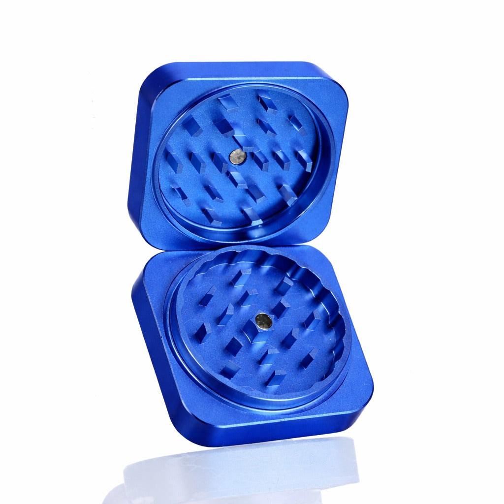 Bong Warehouse Manual Weed Grinder Royal Blue Square Metal Grinder Clamshell Style display Sharp Teeth Anodized Coating Royal Blue Colour CNC Aluminium Weed Grinder with Magnets Open Photo Displaying internal Surface with teeth
