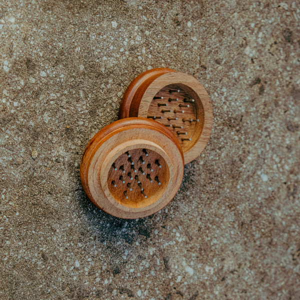 Opened Bong Warehouse Eco Wooden Weed Grinder in Dark wood - on floor