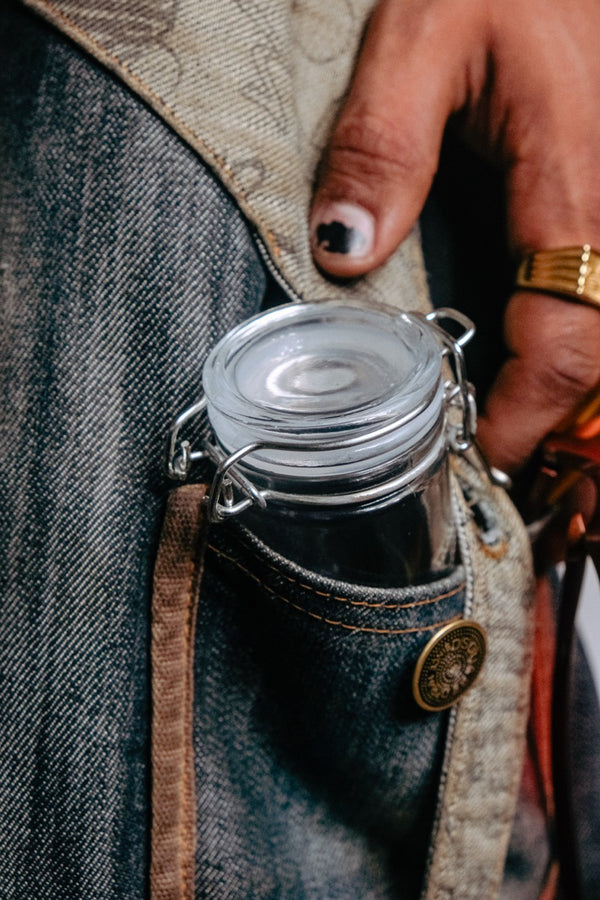 Bong Warehouse Small Clear Weed Stash Jar inside the pocket