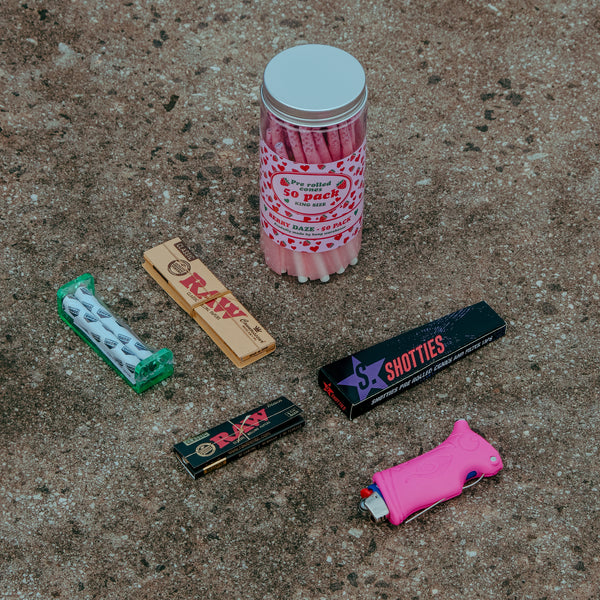 Smoking rolling papers and cones with lighters from Bong Warehouse -On Floor