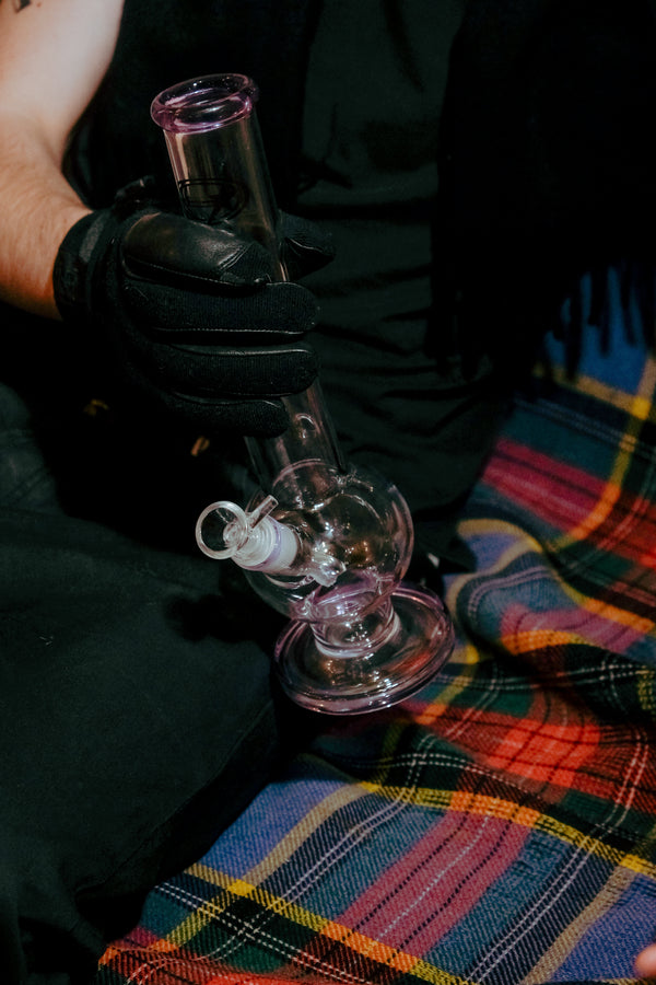 Man holding the Shotties™ - 33cm Glass Bent Bubble Bong in Pink from Bong Warehouse