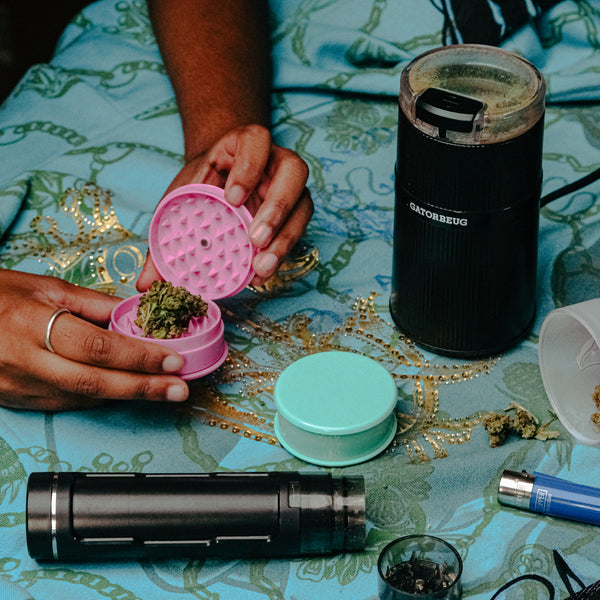 Ground herbs in Bong Warehouse Plastic Manual Weed Grinder in Pink