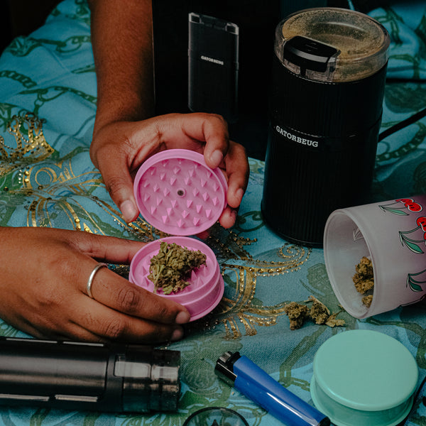 Grinding weed with a Bong Warehouse Weed Grinder from the collection