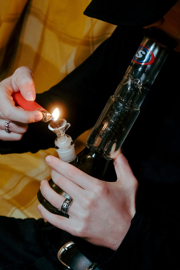 Lighting up a Shotties™ - 30cm Spiral Perk Glass Beaker Bong in Clear Smokey glass from Bong Warehouse