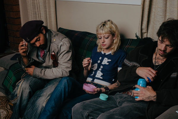 Friends using Bong Warehouse Weed Grinders