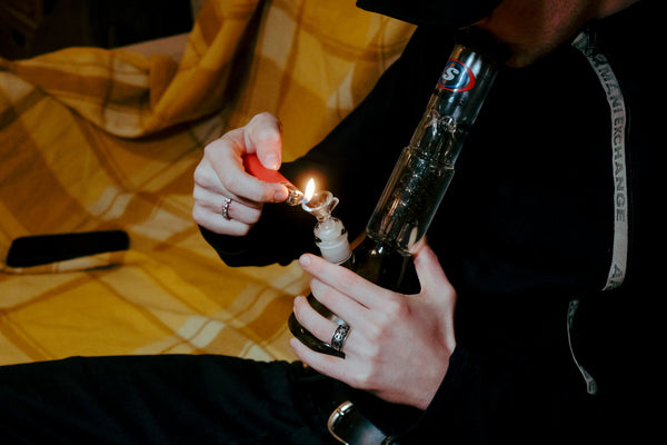 Lighting up the Shotties™ 30 cm Spiral Perk Glass Beaker Bong in clear and smokey glass from Bong Warehouse