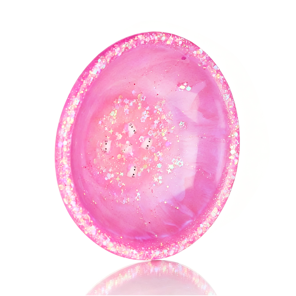 Pink Hello Kitty Chop Bowl with a reflective surface on a white background