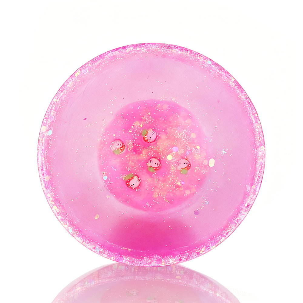 Pink Hello Kitty Chop Bowl with a reflective surface on a white background