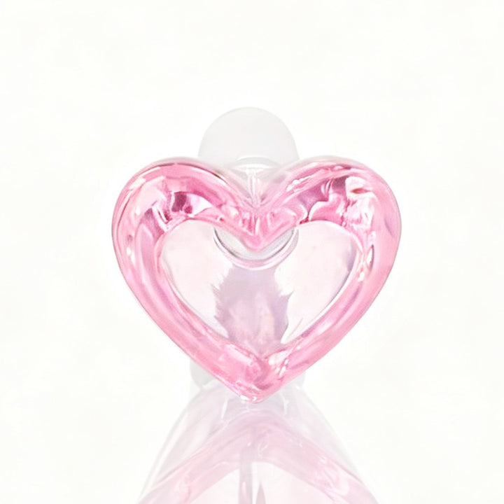 Pink Glass Heart shaped Cone Piece on a White Background