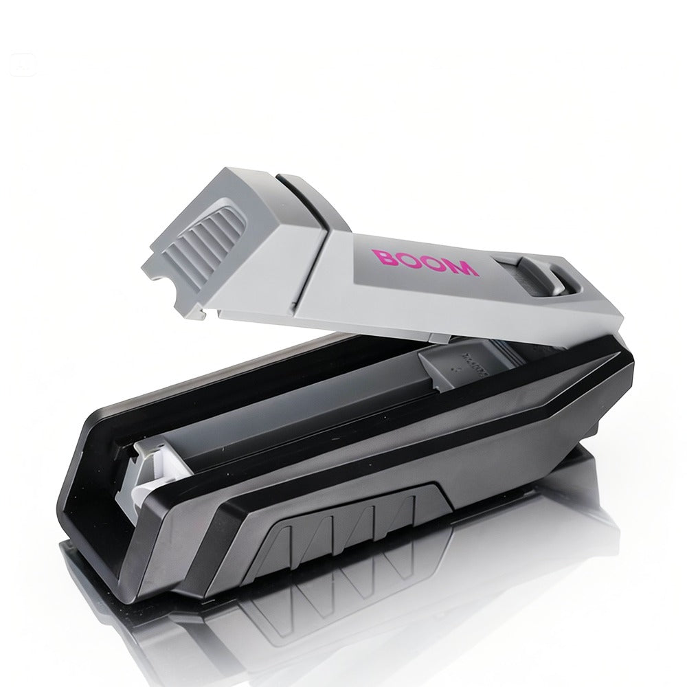 Black and gray device with 'BOOM' branding on a white background