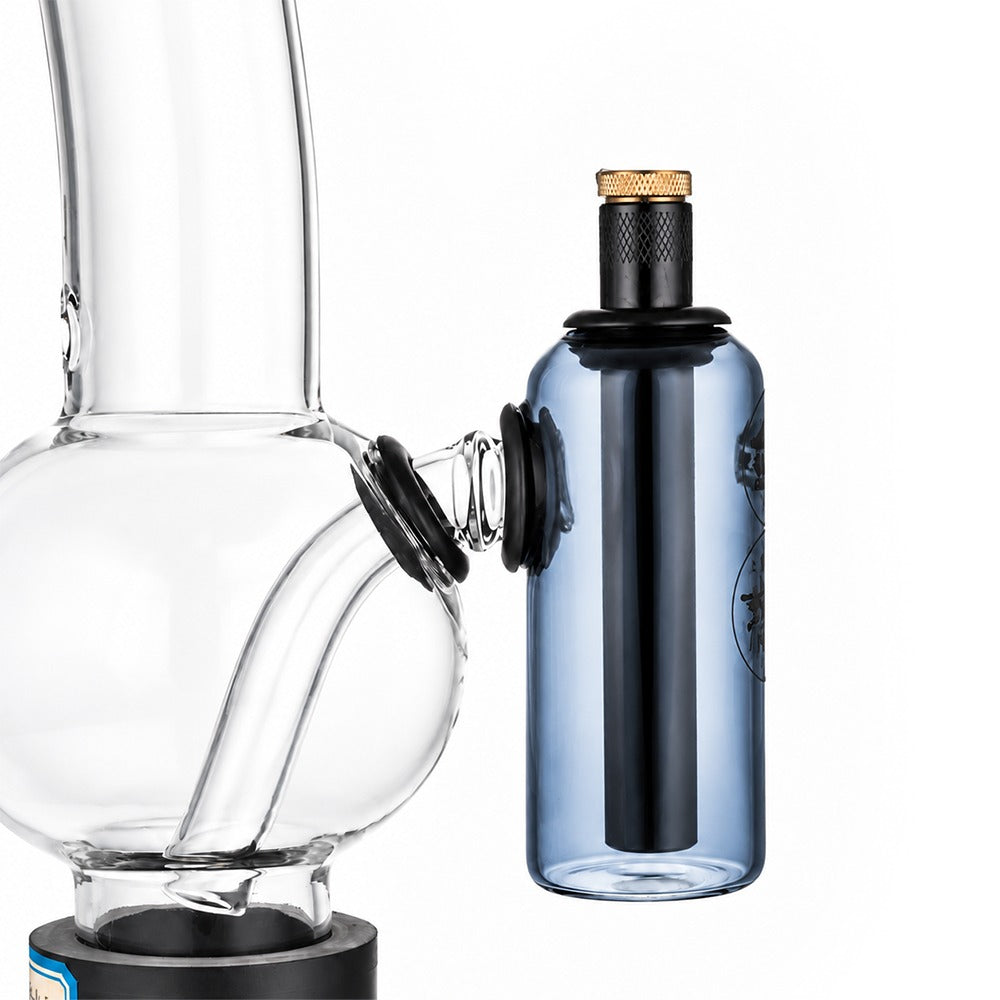 Neon grey tube ash catcher fitted to a glass bong, close-up of the 15mm tube seated in the silicone grommet