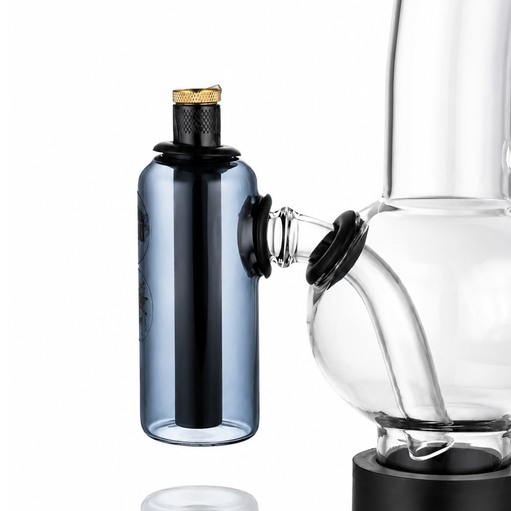 Neon grey tube ash catcher fitted to a glass bong, side view