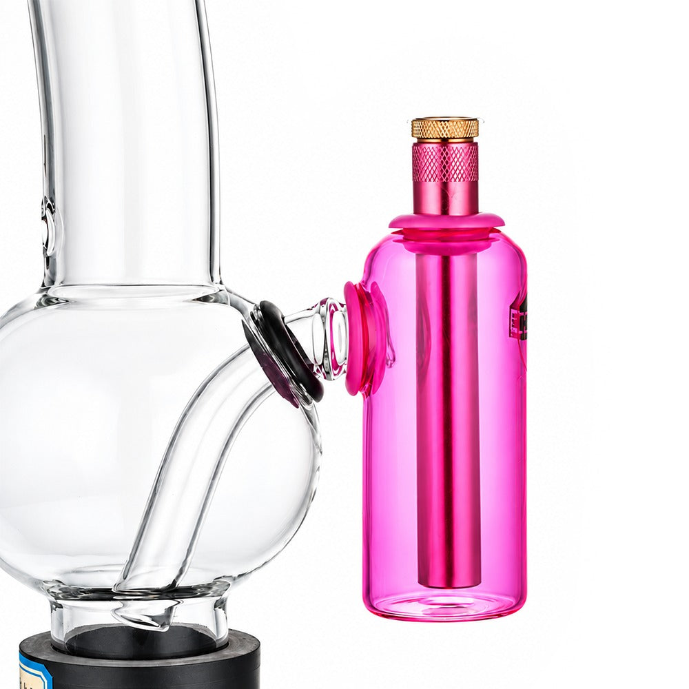 Pink tube ash catcher fitted to a glass bong, close-up of the 15mm tube seated in the silicone grommet