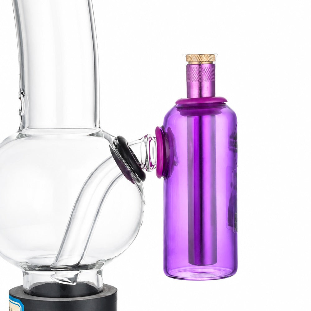 Purple tube ash catcher fitted to a glass bong, close-up of the 15mm tube seated in the silicone grommet